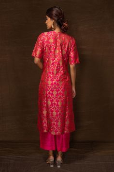 Pink banarasi silk kurta with floral pattern and side pockets. Comes with pant.
Components: 2
Type Of Work: Floral
Neckline: Round
Sleeve Type: Half
Fabric: Banarasi silk
Color: Pink
Other Details: 
Side slits on kurta
Occasion: Sangeet - Aza Fashions Round Pattern, Types Of Work, Silk Kurta, Pant Set For Women, Pant Set, Set For Women, Half Sleeve, Aza Fashion, Sleeve Type