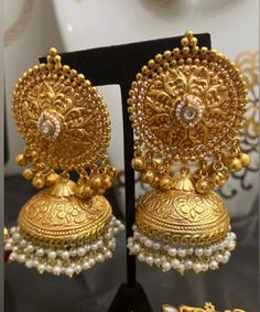 Silver/Gold Jhumka with  stone and pearl strings Big Jhumka Earrings Gold, Bareilly Jhumka, Big Jhumka Earrings, Pearl Strings, Gold Jhumka, Gold Jhumka Earrings, Patterns Flowers, Gold Jewellry, Fancy Jewellery Designs