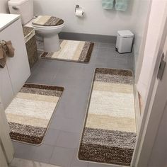 the bathroom is clean and ready for us to use it's own rugs