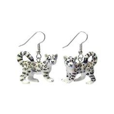 pair of white and black leopard earrings with silver earwires hanging from the ends