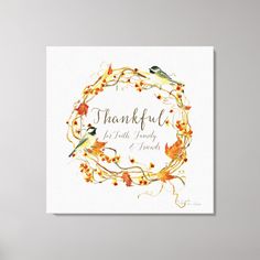 a thank card with birds and flowers in a wreath on the front, says, thanks for all family and friends