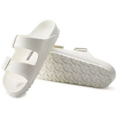 Arizona EVA Durable Open Toe Slides For Beach, Durable Open Toe Synthetic Slides, Durable Summer Slide Sandals, Durable Synthetic Open Toe Slides, Durable Synthetic Slides For Summer, Durable Open Toe Slides For Summer, Durable Synthetic Sandals For Summer, Summer Open Toe Slides, White Slides With Cork-bed Midsoles For Beach