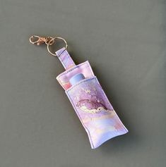 a keychain that has a lighter in it