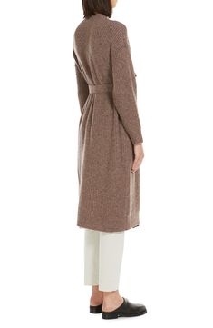 Feel like you're snuggled in a blanket as you go about your day in this tweedy wool-blend duster that's cinched with a tie belt. Open front V-neck Long sleeves Front patch pockets Ribbed cuffs and hem Removable tie belt 66% wool, 32% polyamide, 2% elastane Hand wash, dry flat Imported Round Neck Cardigan, Belted Cardigan, Duster Cardigan, Beige Cardigan, Wrap Cardigan, Cotton Cardigan, White Cardigan, A Blanket, Cropped Cardigan