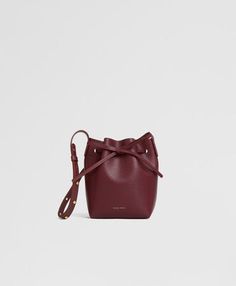 Mini Mini Bucket - Claret Classic Textured Leather Coated Canvas Bag, Elegant Burgundy Leather Bucket Bag, Textured Leather Burgundy Bag For Office, Modern Burgundy Shoulder Bag With Dust Bag, Modern Saffiano Leather Shoulder Bag With Smooth Grain, Burgundy Textured Leather Bag For Office, Burgundy Textured Leather Office Bag, Classic Shoulder Bag In Textured Leather And Coated Canvas, Designer Structured Bag With Smooth Grain