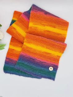 Introducing our exquisite handmade scarf, a perfect blend of warmth, style, and craftsmanship. Each scarf is meticulously crafted with love and attention to detail, making it a unique and cozy accessory for any occasion. 🌈 Soft and Luxurious: Our scarves are made from high-quality, ultra-soft yarns that provide a gentle embrace against your skin. The luxurious feel ensures comfort and warmth, making it your go-to accessory for chilly days. 🎨 Vibrant Colors: Embrace the beauty of a rainbow with our scarf's vibrant and eye-catching colors. Each hue is carefully selected to add a touch of joy and positivity to your outfit, making it an ideal accessory for both casual and formal wear.✨  Lenght:135 cm  Widht:20 cm Handmade Cozy Shawl One Size, Hand Knitted Multicolor Yarn Shawl, Multicolor Knitted Shawl One Size, Handmade Yarn Scarves One Size, Cozy Handmade Yarn Scarf, One Size Multicolor Knitted Shawl, Handmade Casual Infinity Scarf One Size, Handmade Cozy Acrylic Scarves, Casual Handmade Infinity Scarf One Size