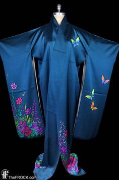 "www.TheFROCK.com www.CTMadrigal.com www.amazon.com/author/ctmadrigal Vintage teal silk furisode kimono robe, coat, or dressing gown teeming with colorful butterflies and flowers. Silk interior. Condition is excellent with age-appropriate wear. Measures about 46\" around when tied and 67\" long. Layaway is available. Age-appropriate wear on vintage and antique kimonos may include slight color variation or bleed on vintage and antique hand-dyed kimono textiles, light soil and/or discreet marks fr Blue Silk Kimono For Wedding, Blue Silk Wedding Kimono, Blue Silk Long Sleeve Kimono, Blue Kimono For Spring Tea Ceremony, Blue Bohemian Kimono For Wedding, Bohemian Blue Kimono For Wedding, Blue Kimono With Kimono Sleeves For Tea Ceremony, Traditional Blue Kimono For Tea Ceremony, Blue Kimono Sleeve Robe For Festivals