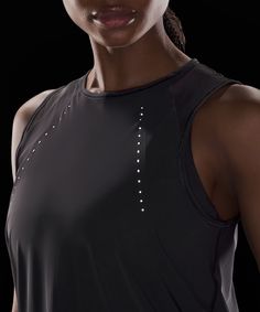 Sprints anyone This lightweight tank has mesh fabric panels for breathability in sweaty situations. Designed for Running. An easy fit that floats away from your body:Sits below the waistband for moderate, everyday coverage. Reflective details help keep you on the radar. Jumper Short, Tennis Shop, Running Workout, Back Women, Lululemon Women, Fabric Panels, Sleeveless Tank Top, Sleeveless Tank, Black Tank Tops