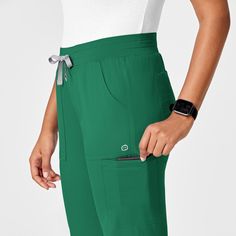 Designed to work in comfort but stylish enough for your days off, the Women’s Wink PRO Slim Leg Cargo Pant is a multi-faceted pant intended for all day comfort, style and durability. With an easy care polyester, rayon, and spandex fabric that you can wash, wear and go, this modern pull-on scrub pant features a front drawstring with a soft rib waistband with flat front piecing and a mock fly. Two side pockets, one with a small card or accessory pocket, two cargo pockets, the left one with a snug Leg Scrub, Womens Scrubs, Women Of Faith, Cargo Pocket, Soft Leggings, Cargo Pant, Men's Knit, Scrub Pants, Slim Leg