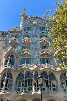 an ornate building with many windows and balconies