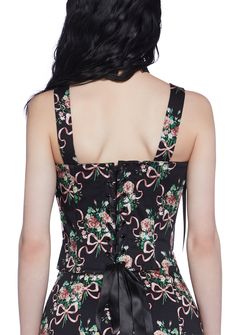 cuz you exude a dark enchantment. This top has a taffeta construction, an all over floral bow print, structured boning, satin ribbon ties, a back lace-up design, and a side zipper closure. Floral Print Fitted Corset For Party, Fitted Floral Print Corset For Party, Fitted Floral Print Party Corset, Fitted Tie-back Corset For Parties, Spring Party Corset With Tie Back, Black Satin Sleeveless Corset, Party Corset With Tie Back And Sleeveless Design, Party Corset With Tie Back, Sleeveless Floral Print Corset For Party