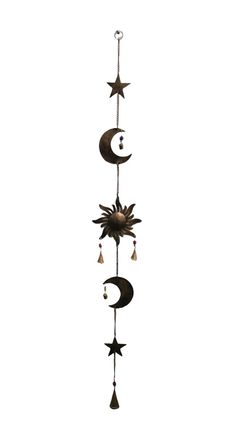 the sun and moon wind chime is hanging