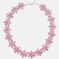 Enhance your outfit with our elegant Rhinestone Flower Necklace. The delicate pink flowers adorned with sparkling rhinestones add a touch of glamour to any look. Perfect for a special occasion or everyday wear, this necklace is sure to impress. * Return and exchange are not supported Pink Jeweled Rhinestone Necklace For Party, Pink Feminine Flower Pendant Necklace, Elegant Pink Crystal Necklace For Party, Glamorous Pink Rhinestone Necklace For Party, Pink Flower-shaped Necklace With Flower Decoration, Crystal Flower-shaped Necklaces For Parties, Pink Flower Necklace With Flower Decoration, Pink Rhinestone Party Necklace, Feminine Pink Flower Shaped Necklace