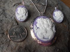 "For sale are perfectly detailed, flawless sisters, mother/daughter, generations, friends cameo pendant silver plated locket and earrings Gorgeous The locket is 2\" long and the earrings 1\" long The silver plated locket has victorian etching and holds two photos inside (or treasured keepsakes). The French earrings are also silver plated, about 1\" long and very nice quality!! Heirloom quality, to pass down from generation to generation I make this style, in several colors and even hand painted Silver Cameo Earrings As A Gift, White Jewelry With Hallmark, White Jewelry Gift For Mom, Collectible White Cameo Jewelry, Silver Cameo Jewelry For Anniversary, Classic Nickel-free Jewelry For Mother's Day, Sterling Silver Cameo Jewelry For Anniversary, Sterling Silver Cameo Jewelry For Gift, Wedding Sterling Silver Cameo Jewelry