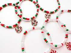 Here are the Christmas bracelets coming! Those bracelet are made by simple way, red, green, pearl white and glass white are the main colors. I add candy pendant on the bracelets to make them look cuter and joyful.  You can choose a single bracelet, or a set (can be with ring too). I also do personalization, you can simply give me a name or word or number, such as: Happy. Material: Glass beads, alloy pendant Size:  Bracelet: 14cm, 15cm, 16cm, 17cm, 18cm Ring: size 6, 7, 8, 9, 10 Christmas Bead Bracelet Ideas, Heishi Bracelets, Bracelets To Make, Holiday Bracelets, Single Bracelet, Bracelet Christmas, Christmas Bead, Christmas Bracelet, Christmas Jewelry