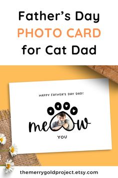 a father's day photo card for cat dad with daisies on the table