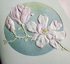 a close up of a card with flowers on it