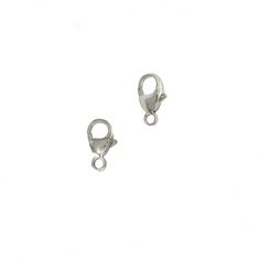 pair of silver earrings on white background with clipping for earring, front and back view