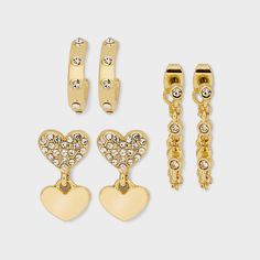 Ready to shine? Instantly level up any look with the SUGARFIX by BaubleBar Crystal Earring Set. These three pairs are all made to impress with gorgeous gold and shimmering stone detailing. Pick the pair that suits your mood or mix and match to create a dazzling ear stack. Crystal Statement Earrings, Pumpkin Earrings, Ear Stack, Gold Statement Earrings, Hoop Earring Sets, Accessories Jewelry Earrings, Beaded Hoop Earrings, Beaded Hoops, Hoop Earrings Small