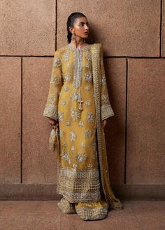 "Explore our stunning collection of Pakistani and Indian wedding dresses and formals. Featuring our Desi Designersjorray  Nikkah Garara, Shalwar Kameez, Anarkali Suits, Sharara Suits, Gharara Suits, Lehenga Choli, Long Gowns and Designer Sarees. Shop online for the latest Pakistani and Indian bridal wear, perfect for your special day. Get ready to shine in our elegant and affordable dresses, designed to make you look Fabulous. Whether you're in the UK or USA, our Pakistani and Indian wedding dresses are just a click away!" Details: Fabric: Net Heavy hand embellished and Spangle work embroidered Shirt Full Embroidered  bordered dupatta ... Sequence Embroider boarder Loose Dhaka pajama Disclaimer:  Product color may slightly vary due to photographic lighting sources or your monitor settings. Rokha Outfits, Nikkah Garara, Yellow Indian Outfit, Asian Fits, Suits Sharara, Gharara Suits, Bridal Mehndi Dresses, Desi Outfits, Sharara Suits