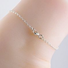 Silver butterfly anklet made with a beautiful and dainty sterling silver crystal encrusted butterfly pendant that is suspended on a sterling silver chain with a sterling silver clasp. Choose the size anklet you need from the drop-down menu, bearing in mind that the anklet should be approximately one inch larger than the size of your ankle. The anklet will arrive in an attractive gift box. Adjustable Sterling Silver Bracelet Anklets, Delicate Silver Anklet As A Gift, Silver Delicate Chain Anklet As Gift, Silver Anklet With Delicate Chain As Gift, Silver Delicate Chain Anklet For Gift, Sterling Silver Anklets With Silver Chain As Gift, Delicate Adjustable Silver Anklets, Sterling Silver Chain Anklet For Gift, Sterling Silver Anklet With Silver Chain For Gift