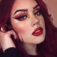 Red Gold Makeup Look, Red Mermaid Makeup, Red Silver Makeup, Ring Leader Makeup, Makeup With Gold Glitter, Chiefs Makeup, Red Fairy Makeup, Red And Gold Eye Makeup, Red And Silver Makeup