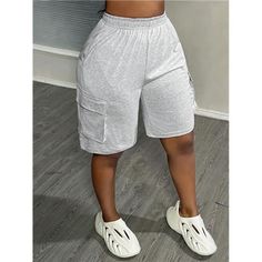 -Item Id 38812393 -Color: Grey -Type: Track Shorts -Waist Line: High Waist -Length: Bermuda Shorts -Fit Type: Regular Fit -Fabric: Slight Stretch, Medium Stretch -Material: Knitted Fabric -Composition: 95% Polyester, 5% Elastane -Care Instructions: Machine Wash Or Professional Dry Clean -Sheer: Semi-Sheer **Open To Offers!!!** **Bundle To Save More** **30% Off Bundles Of 2 Or More Items!!** ***Orders Go Out Within 5-10 Business Days!! Thank You For Your Patience!! Multiple Sizes And Colors Avail Trendy Knee-length Bottoms With Pockets, Gray Short Length Pants With Pockets, Short Gray Pants With Pockets, Trendy Knee-length Solid Color Bottoms, Casual Knee-length Bottoms With Multiple Pockets, Gray Knee-length Shorts With Pockets, Trendy Gray Shorts With Pockets, Gray High-waisted Shorts With Pockets, Bodycon Suit