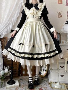 This price includes a dress, an apron and a bowknot jabot. SizeSMLXLBust84889296Full Length105106107108Waist65697377Sleeve Length5858.55959.5Hem Circumference275280285290 Apron Dress Outfit, Baker Outfit, Maid Clothes, Punk Pastel, Halloween Apron, Punk Skirt, Fashion Corset, Gothic Skirts, Punk Dress