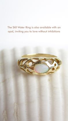 Our reflection cannot be seen in running water. Only in still water can we see our true nature.
Oval opal measures approximately 6x4mm. Measures approximately 7mm at widest point. #opal #opalring #opaljewelry #goldopalring #opals #opalbirthstone #birthstone Spiritual Oval Opal Ring, Oval Opal Ring, Water Opal, Opal Birthstone, Opal Ring Gold, Water Can, Running Water, Handcrafted Rings, True Nature