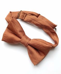 Men’s bow tie handmade using reclaimed silk in a rusty orange shade. Perfect Christmas gift for your boyfriend, husband, father, son or brother. Handmade in the UK, gift boxed and a personalised note can be added to make it extra special. Worldwide shipping too. Click the product to shop. Orange Bow Tie, Christmas Gift For Your Boyfriend, Gifts For Him Christmas, Travel Tin Candles, Womens Cuff Bracelets, Rusty Orange, Orange Bows, Silk Bow Ties, Christmas Gifts For Girlfriend