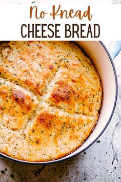 a casserole dish with cheese in it and the words, no knead cheese bread