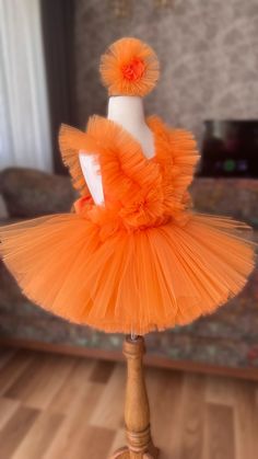 Introducing our Exquisite Orange Tutu Dress for Kids and Babies - A Magical Fairy Dress Delight! Prepare for enchantment with our meticulously crafted Orange Tutu Dress. Perfect for 1st-year birthdays, Halloween, festivals, special occasions, adorable toddler girl costumes, and as a stunning first birthday dress, this creation is a true showstopper. 👑 Unmatched Comfort: Soft Tutu on the outside, cotton lining on the inside. No itching or irritation, just pure comfort for your little fairy. 🌟 T Whimsical Ruffled Fairy Dress For Party, Playful Ruffled Tutu Dress For Party, Whimsical Tutu Dress For Easter Dress-up, Easter Party Tutu Dress With Ruffles, Whimsical Ruffled Tutu Dress For Costume Party, Easter Princess Dress With Ruffles For Party, Whimsical Ruffled Tutu Dress For Pageant, Easter Party Princess Dress With Ruffles, Whimsical Ruffled Tutu Dress For Pageants