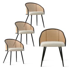 four chairs with black legs and white cushions