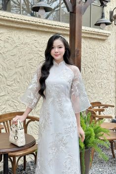 "🌿 This set includes traditional Ao Dai, white pants Style: Modern Material: Very well made with high-quality double layers silk Collar: traditional collar Please provide bust-waist-and hip measurements when placing your order to ensure the best fit for you. 🌿 NOTE: * Recommend gentle washing * Please contact us for any inquiries about size. We don't have an exchange policy for the wrong size * It is safe for a washer and dryer in a \"delicate\" setting. * Actual Ao Dai colors may differ up to 10% due to lightning and viewing devices. * These ao dai pants are made based on Vietnamese size; they will run smaller than American size. *3D printed ao dai: you may see some white broken fabric around the seam (collar). *There might be some chalk/ pen writings on the fabric because it is brand n Ao Dai White, Spongebob Faces, Dot Worksheets, Broken White, Dress Woman, Lesbian Wedding, Yellow Wedding, Grad Dresses, Heritage Fashion