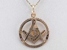 Wonderful details in the gold make this Masonic pendant an outstanding piece of workmanship. The condition is also excellent, and this piece will be a treasured favorite for years to come. This pendant does not come with the chain shown. Please feel free to contact us, we will help you find the perfect chain for your style and budget! Metal: 14K Yellow Gold Measures: 21 x 30 mm, with bail Luxury 14k Gold Large Pendant Jewelry, Luxury 14k Gold Jewelry With Large Pendant, 14k White Gold Jewelry With Large Pendant, White Gold 14k Necklace With Large Pendant, 14k White Gold Necklace With Large Pendant, Symbolic 14k Gold Diamond-cut Jewelry, Symbolic 14k Gold Diamond Cut Jewelry, Symbolic 14k Gold Jewelry With Diamond Cut, Symbolic Gold Medallion Jewelry