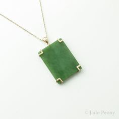 "AAA Siberian Nephrite Jade Necklace - Emerald Green Nephrite Jade - Rectangular Pendant - Statement Necklace - 18kt Yellow Gold Modern with a touch of art deco, this natural untreated Siberian nephrite jade will make the perfect 35th anniversary gift. - - - - - - - - - - - - - - - - - - - - - - - - - - - - - - - - - - - Stone: Siberian Nephrite Jade Size: 40mm length x 30mm width x 6.5mm thick Setting: 18kt Solid Yellow Gold, 8\" chain 100% genuine jade. We work with nephrite jade in its natura Classic Green Necklace With Rectangular Pendant, Green Rectangular Pendant Jewelry For Formal Occasions, Green Rectangular Necklace For Formal Occasions, Green Rectangular Pendant For Formal Occasions, Elegant Green Rectangular Necklaces, Elegant Green Rectangular Necklace, Formal Green Rectangular Necklace, Classic Chrysoprase Gemstone Jewelry, Green Rectangular Pendant Necklace For Formal Occasions