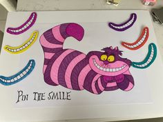 an image of a cartoon character painted on a white board with the words pin the smile