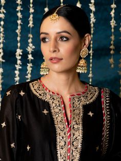 "Jashn-E-Ulfat" - a collection of ensembles that evoke a sense of majestic opulence and modern royalty. Suffused with deep rich hues set on plush cotton silk enhanced with remarkable craftsmanship like Marodi, Mirror and Zardozi embroidery, each ensemble has a romantic and feminine charm of its own collection. This set of 3 consists of a Kurta, Salwar and Dupatta. Kurta: This rich black chanderi silk kurta is enhaced with gold marodi work on the neck and sleeves and beautifully detailed with del Marodi Work, Silk Kurta Set, Modern Royalty, Zardozi Embroidery, Silk Kurta, Pakistani Dress, Kurta Set, Best Deal, Pakistani Dresses