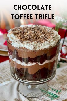 chocolate toffe trifle in a glass dish on a table