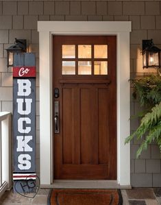 a front door with a sign that says buck's on it