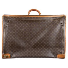 Crafted from Louis Vuitton's signature coated canvas, the bag features a leather-reinforced top handle and brass hardware with a numeral lock, plus a spacious interior with side pockets and straps. Remarks: There are many signs of wear. Bag Suitcase, Bag Travel, Bag Bag, Brass Hardware, Luxury Watches, Fashion Handbags, Travel Bag, Travel Bags, Louis Vuitton Monogram