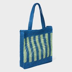 Hold your daily essentials in style with this Stripe Straw Crochet Tote Handbag from A New Day™. This fashionable tote handbag features an unstructured silhouette that's decorated with woven-texture crochet detailing with yellow and light beige stripes. The single main compartment helps keep your cellphone, wallet and more in one spot, while the double handle makes it easy to carry in hand or on your shoulder. Universal Thread™: Found exclusively at Target. Trendy Crochet Tote Bag For Shopping, Casual Beach Shoulder Bag With Reinforced Handles, Blue Large Capacity Beach Bag For Spring, Casual Shoulder Bag For Beach With Reinforced Handles, Blue Rectangular Bags For Spring, Casual Shoulder Bag With Reinforced Handles For Beach, Blue Square Shoulder Bag For Spring, Rectangular Beach Shoulder Bag With Reinforced Handles, Summer Beach Bag With Reinforced Handles For Shopping