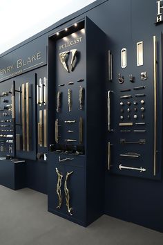 the display case is full of all kinds of jewelry and watches, including one for men