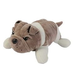 a small stuffed dog laying on its side