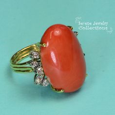 This rare Japanese Momo Coral Ring is set in 18k solid gold. 6 round diamonds and 4 marquise diamonds surround the coral. Ring Size: 6 Total Weight: 11.7 grams Precious Metal: 18k solid gold Precious stones: -Coral Center Stone: 25.5mm x 17.8mm -White Round and Marquise Diamonds Elegant Multi-stone Orange Rings, Elegant Coral Oval Rings, Elegant Oval Coral Rings, Elegant Orange Multi-stone Rings, Elegant Coral Rings For Anniversary, Elegant Coral Ring Jewelry, Luxury Coral Jewelry For Formal Occasions, Elegant Coral Jewelry For Anniversary, Formal Coral Oval Jewelry