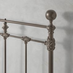 the headboard and foot board of a metal bed