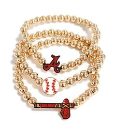 three gold beaded bracelets with baseball charms