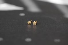 * Two Studs Per Order! * Rose Gold Option Available: https://its9am.etsy.com/listing/1770312168/14k-solid-rose-gold-flower-studs * Measurements: length 10mm x width 4mm x height 4mm MATERIALS: 14K Solid Gold studs including the posts and backings; 18k Gold Plated on top of the 14k Solid Gold for a deeper gold color HYPOALLERGENIC: All our earrings are made of hypoallergenic, lead-free, and nickel-free materials such as brass, stainless steel, silver, gold, or rhodium. You can wear them comfortab Dainty Yellow Gold Earrings With Flower Charm, Dainty Yellow Gold Earrings With Birth Flower, Dainty Yellow Gold Birth Flower Earrings, Dainty Yellow Gold Flower Earrings, Gold Flower Stud Earrings, Bridal Shower Presents, Piercing Earrings, Rose Gold Flower, Studs Gold