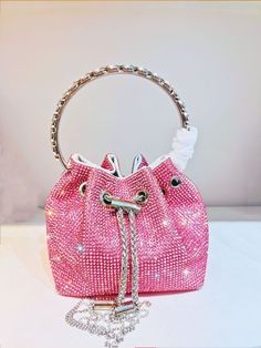 Product Attributes:Color Options: Silver Trumpet, Silver Large Size, Golden Trumpet, Golden Large Size, Colorful Trumpet, Green Plaid Trumpet, Pink Plaid Trumpet, Red Trumpet, Pink Trumpet, Gradient Colorful TrumpetMaterial: PUTrendy Bag Style: Bucket BagBag Size: SmallPopular Elements: Chain, LockLining Texture: NylonBag Shape: Bucket TypeOpening Method: LockPackage Internal Structure: Mobile Phone BagHardness: Medium to SoftOuter Bag Type: Three-dimensional BagMezzanine: NoneNumber of Shoulder Straps: Double RootsApplicable Scene: Daily Matching Pink Clutch With Chain Strap For Events, Pink Bucket Bag For Party, Pink Bucket Bag For Parties, Glamorous Pink Evening Bag As Gift, Glamorous Pink Evening Bag For Gifts, Pink Clutch With Chain Strap, Pink Clutch With Chain Strap As Gift, Pink Clutch With Chain Strap For Gift, Pink Evening Bag With Chain Strap