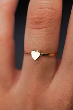 The small heart adds a lovely detail to this lightly hammered stacking ring. Each ring is handmade to order in your ring size for a perfectly customized fit. This ring makes for the perfect anniversary, birthday or valentine's day gift for your special somebody! The band measures approximately 1mm in width and features a lightly hammered finish. The Heart detail measures approximately 5mm in width. This listing is for ONE SINGLE Heart Ring in 14K GOLD FILL metal.  This ring is a great alternativ Finish The Heart, Love Valentines Day, Minimal Ring, Free Love, Tiny Rings, Hammered Band, Ring Stacking, Mini Heart, Small Heart